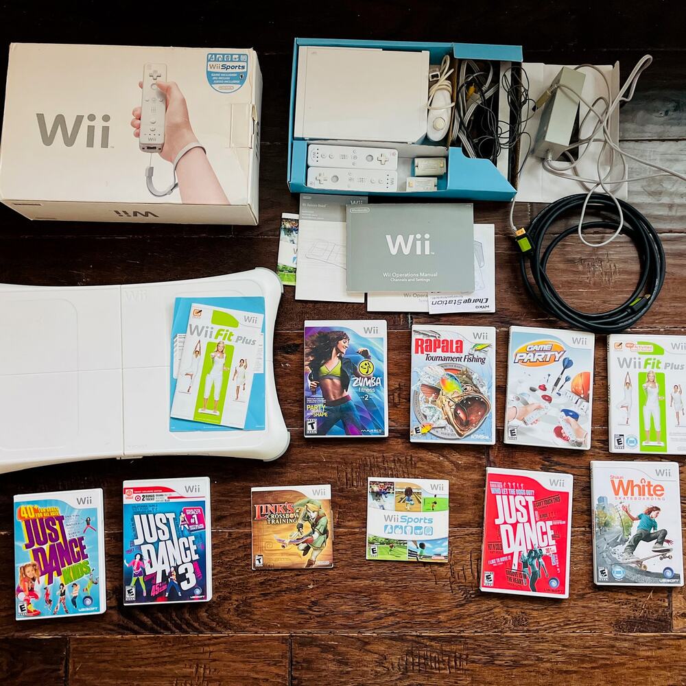 Nintendo Wii console With Box, All controllers/wires, fit board, and 10 games